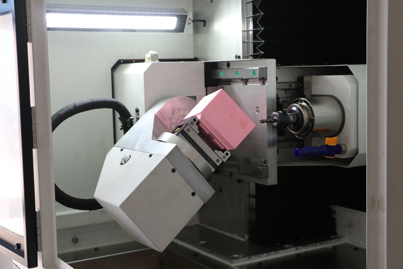 BC trunnion holding an angled workpiece inside the machine